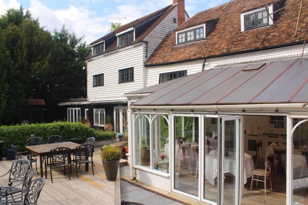 The conservatory and terrace seating at Sheene Mill, Melbourn