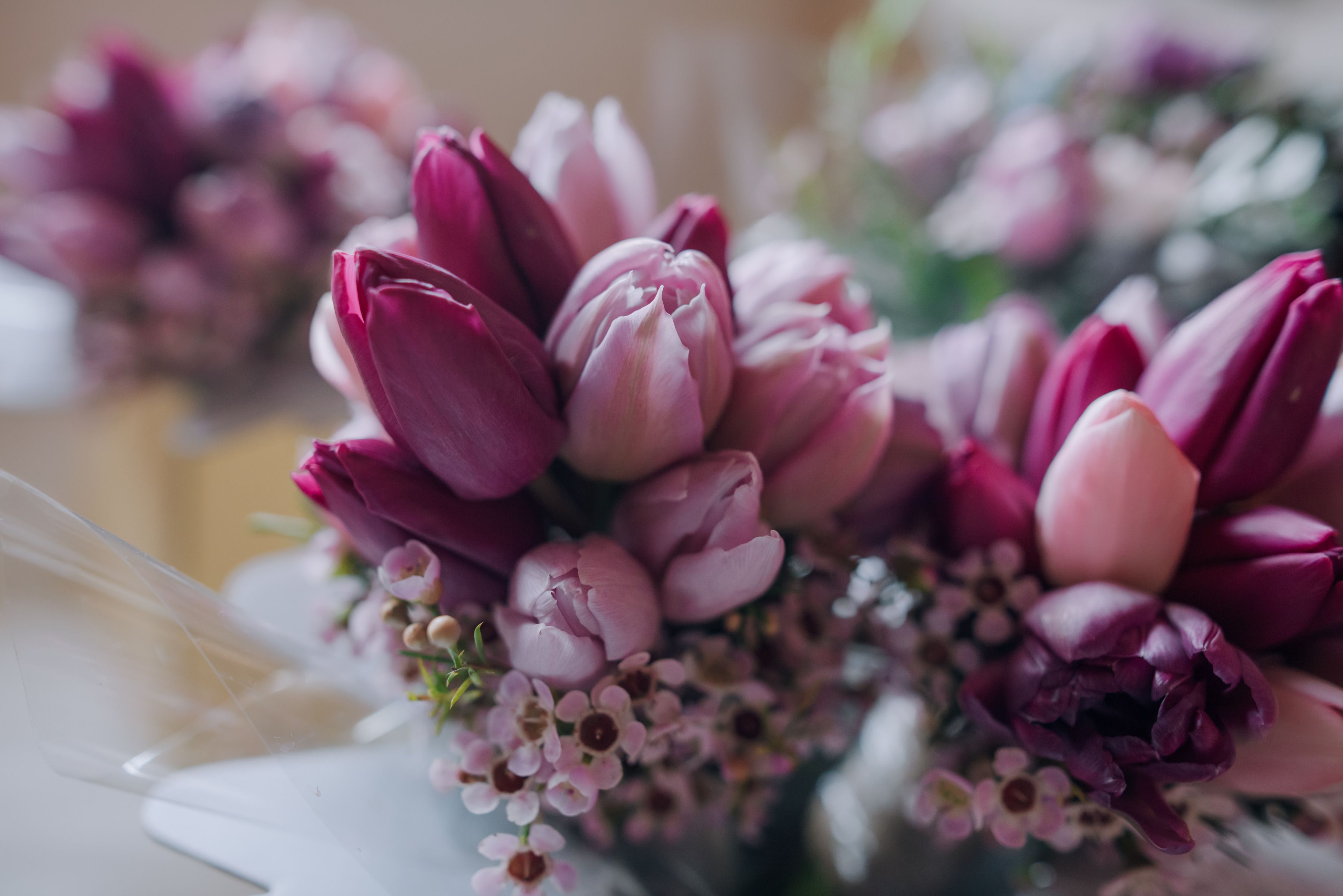 Pink and purple tulips in a wedding floral arrangement at Sheene Mill